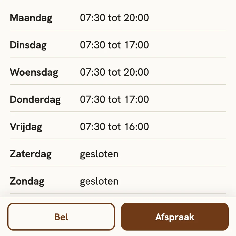 De onderkant van de voorbeeldsite op een telefoon, met een vaste balk met Bel en Afspraak